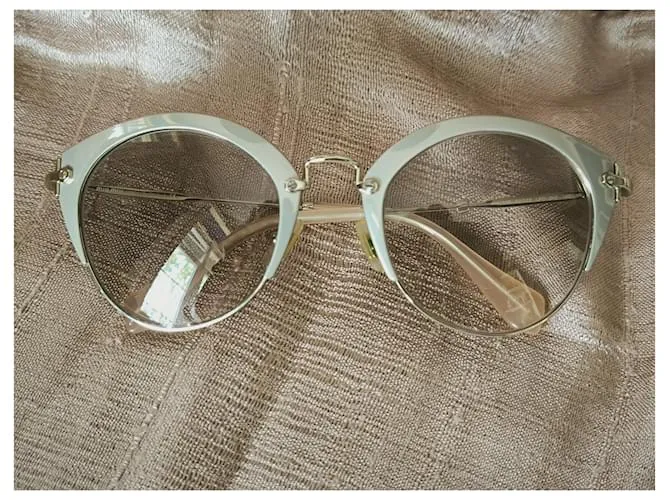 Miu Miu Gafas de sol Crudo 