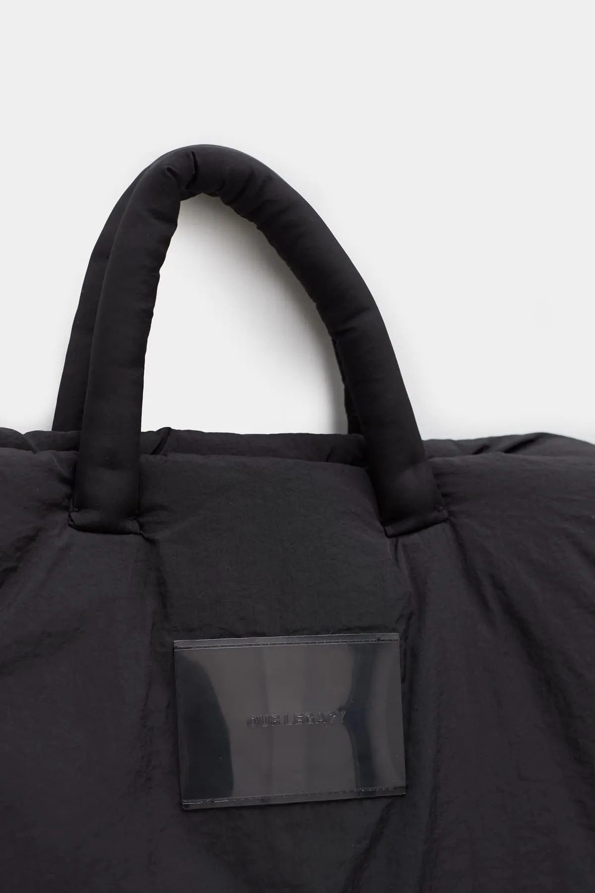 OUR LEGACY BLACK NYLON PILLOW TOTE BAG