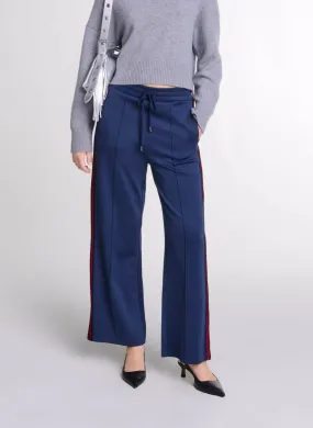 Pantalón jogger ancho bordado en azul